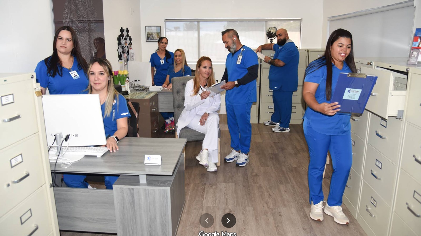 The Global Care Home Services equipo en su oficina de Goulds, Florida